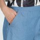 Poche italienne du bermuda Diane avec passepoil lurex cuivré.