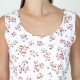 Détail du jersey blanc à petites fleurs du crop top Linda et de l'encolure devant.