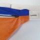 Détail du zip métallique et de l’étiquette hysteriko de la banane Damier