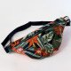 Sac banane femme Fanny Jungle à imprimé végétal noir vert et orange